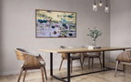 Elegant dining room wall decor featuring a large horizontal water lilies painting in a premium wooden frame. The statement contemporary artwork hangs on a neutral wall above a long minimalist wooden dining table with designer walnut chairs.