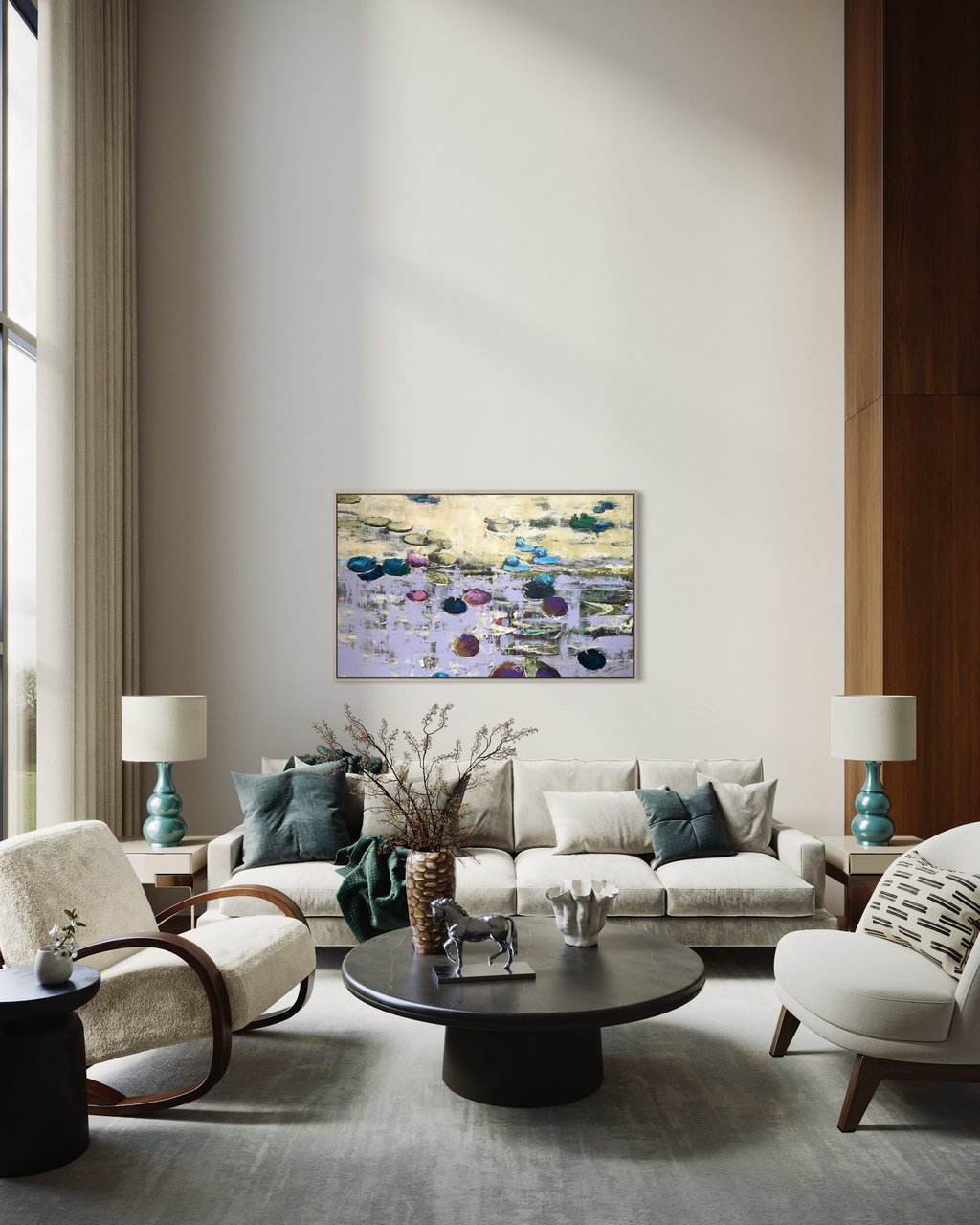 Large horizontal impressionist water lilies painting styled in an upscale luxury living room with double-height walls. The purple and teal fine art piece hangs above a premium cream white sectional sofa decorated with rich green and blue velvet pillows.